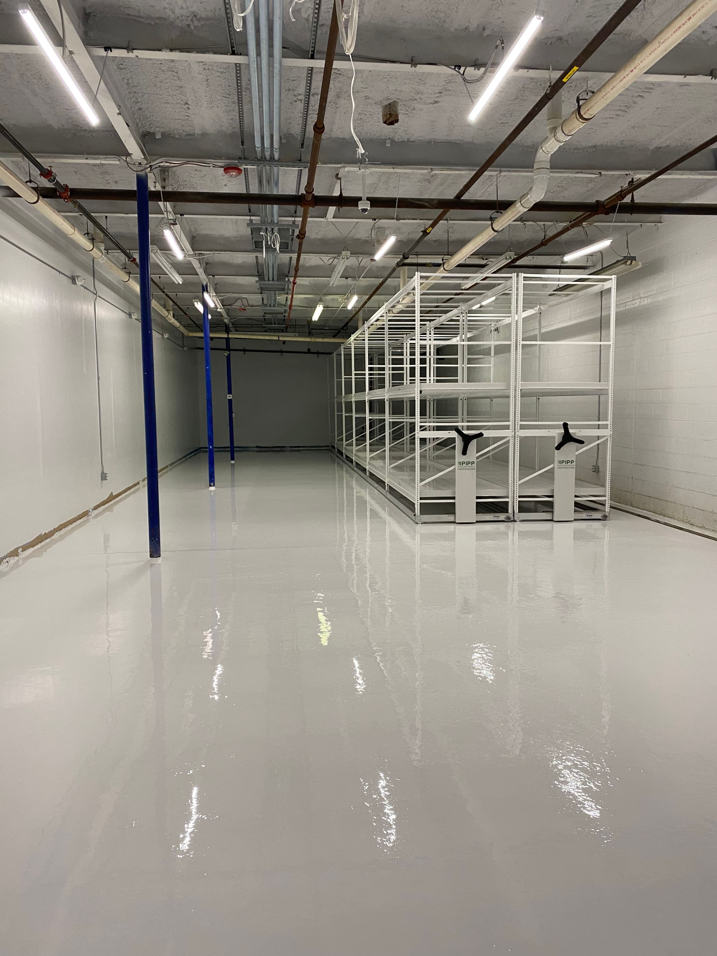 Industrial floor beneath pallet racking