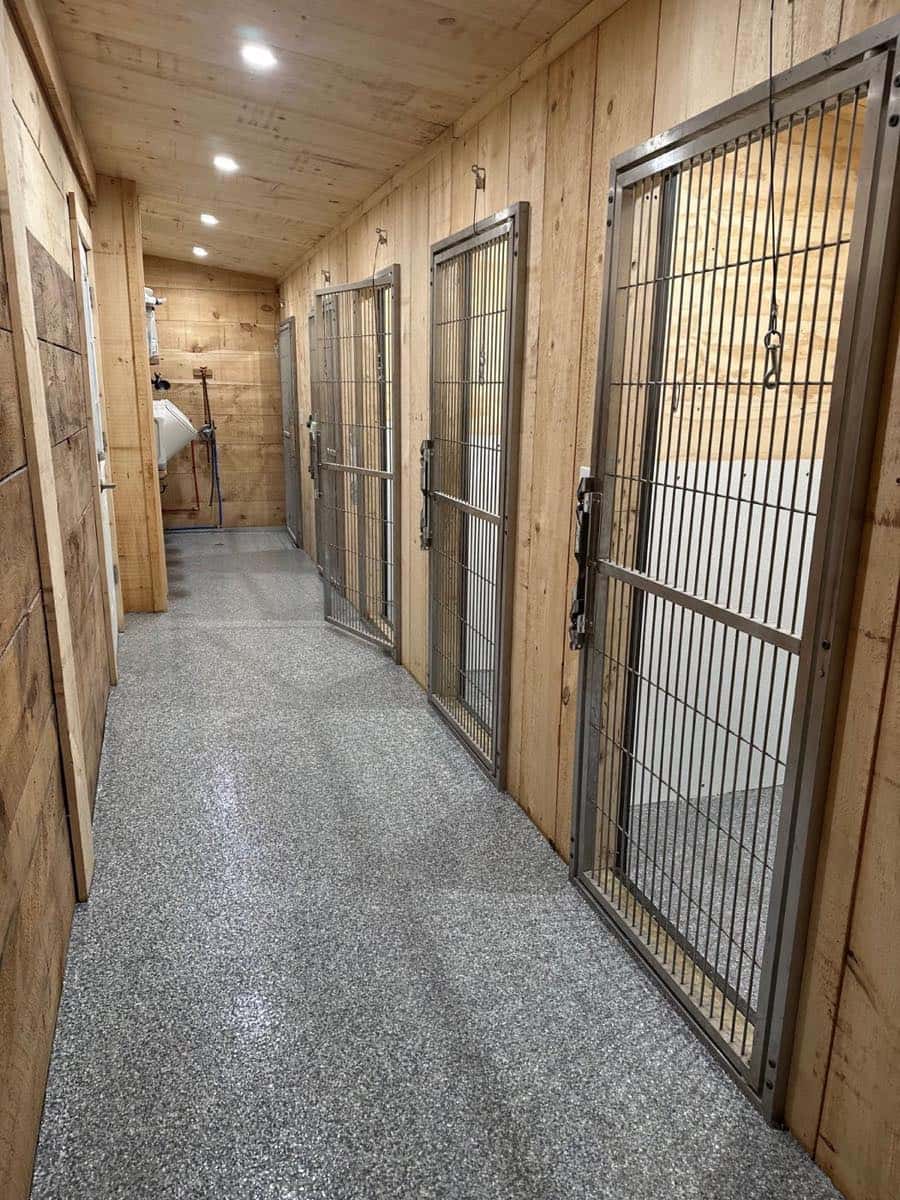 Dog kennel runs coated with seamless flake epoxy flooring