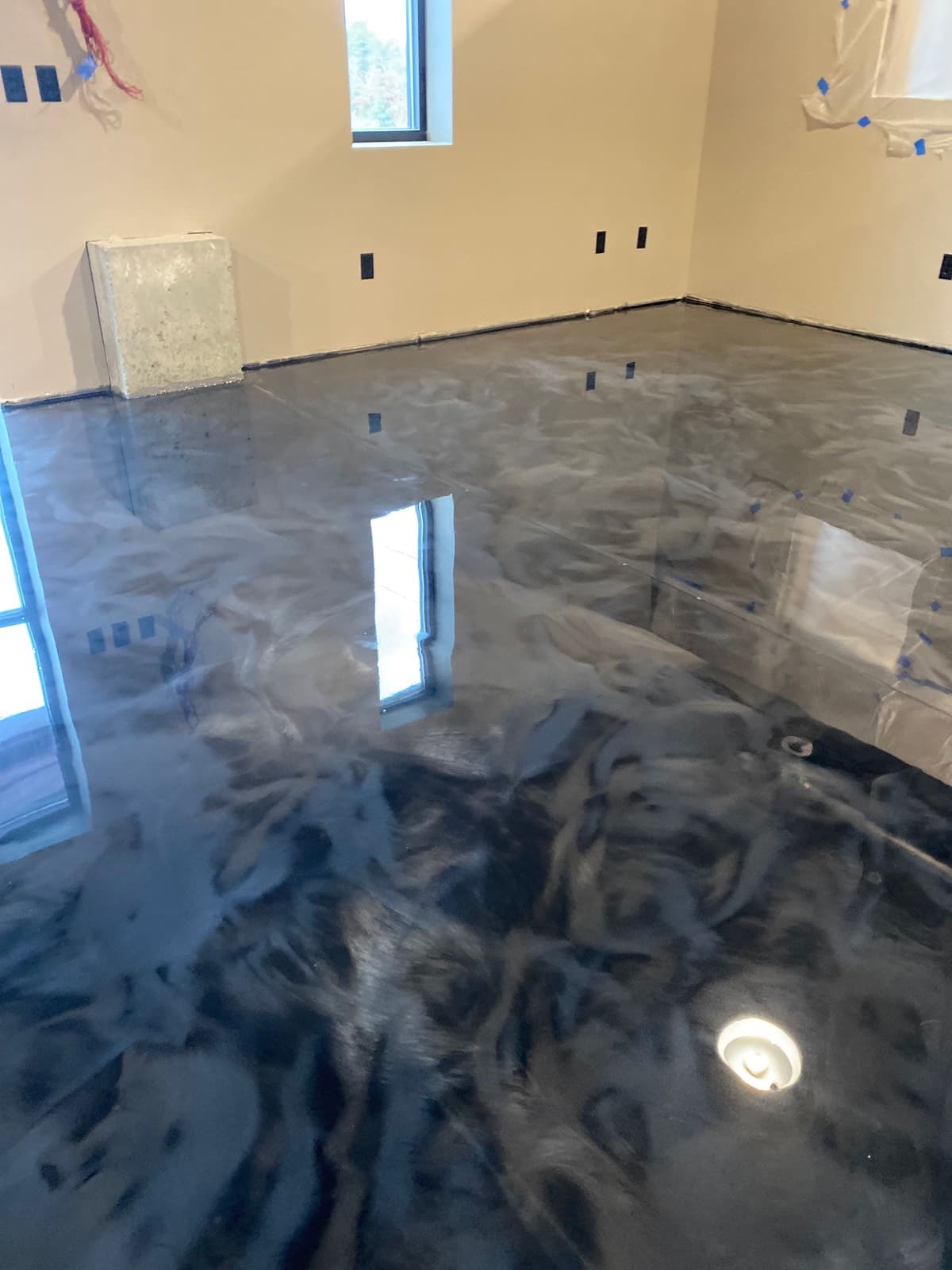 Dark metallic epoxy with swirled pattern